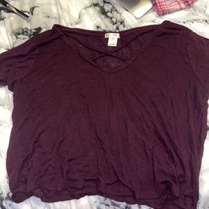 purple t shirt with cross neck